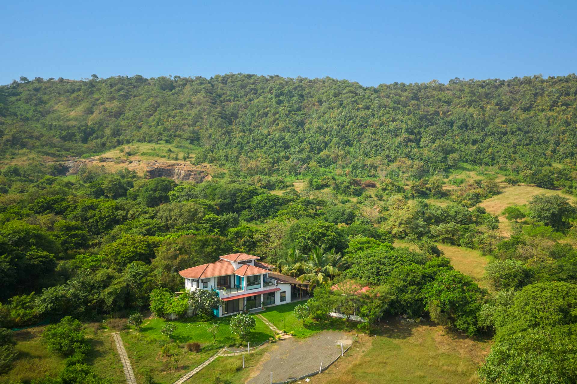 Read more about the article House Below The Hill